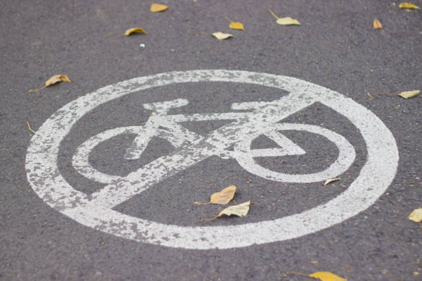 istock there is no road for cyclists. road safety. 1208804913