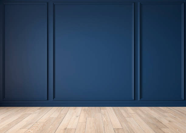 Classic blue color interior blank wall with moldings, wood floor. Classic blue color interior blank wall with moldings, wood floor. 3d render illustration mock up. shaping room stock pictures, royalty-free photos & images