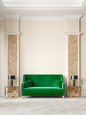Art deco style beige interior with green sofa, columns, table lamp, moldings. 3d render illustration mock up.