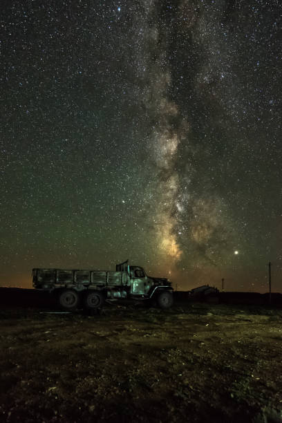 istock Milky way over a scrap truck 1208806853