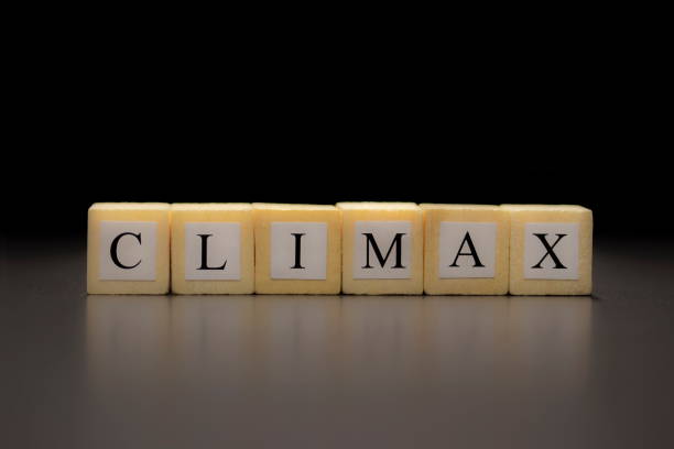 istock The word CLIMAX written on wooden cubes isolated on a black background... 1208808024