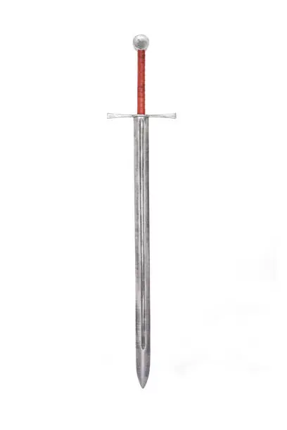 Metal sword on a white background with a brown hilt and an unusual guard. Witcher sword made of wood and painted with silver paint. Steel blade.