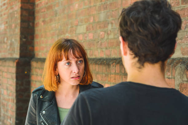 istock Young couple having argument and quarrelling with each other 1208808572