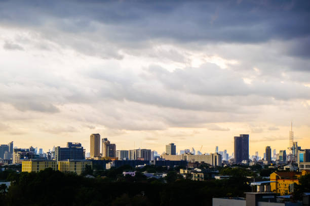 Raining cloud over skyscraper of modern city building, Storm into city