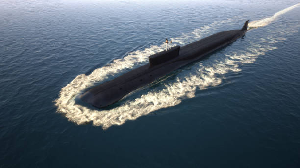 submarine floating in ocean - submarine navy underwater military ship imagens e fotografias de stock