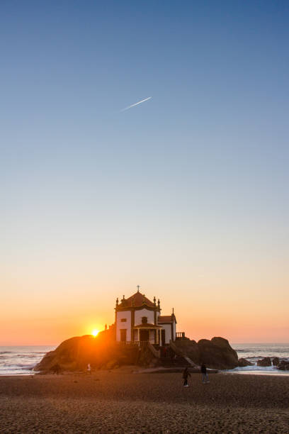 istock Church in the stone and the beach 1208811558