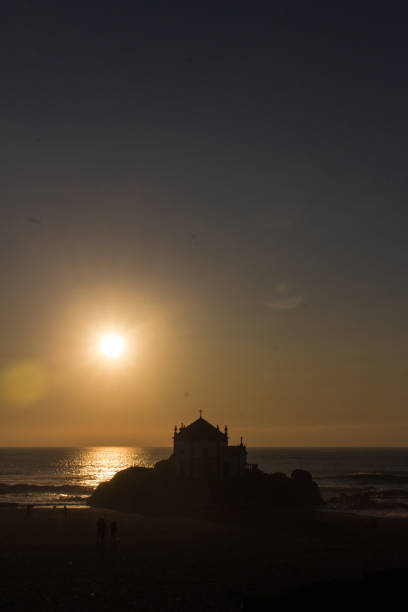 istock Church in the stone and the beach 1208811731