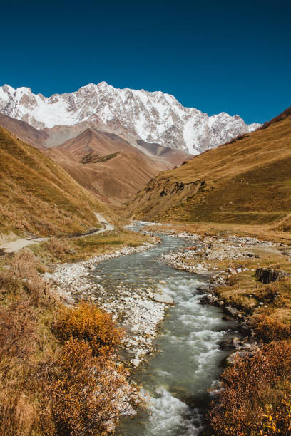 istock The river flows from the snowy mountains in the fall 1208812186