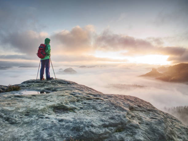 istock Tourist in windcheater with backpack enjoy amazing daybreak 1208813237