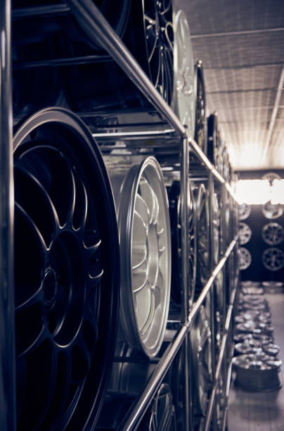 istock Alloy car wheels in a row 1208813248