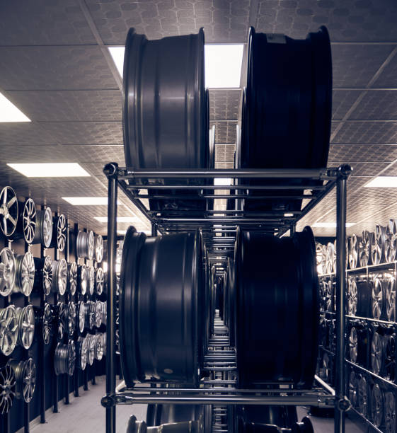 istock Alloy car wheels in a row 1208813334