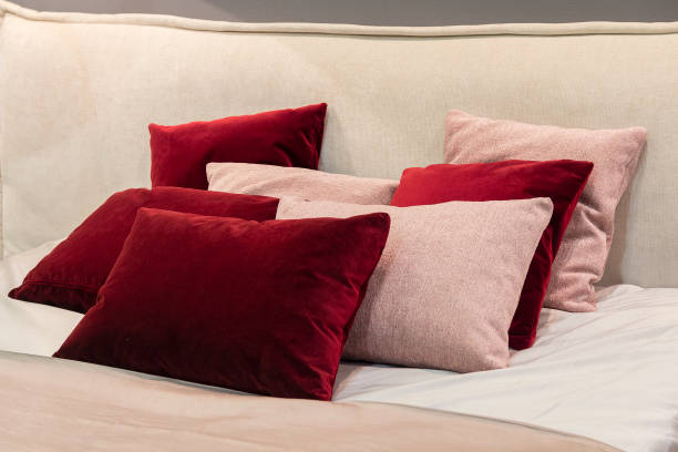 soft pillows on the bedroom bed. interior - wakening imagens e fotografias de stock