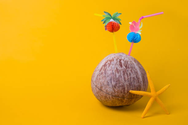 Exotic drinks with coconut on a beach