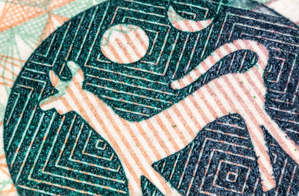 Close up on 50 Ringgit Malaysia a macro photography of the logo of bank negara Malaysia, taken from a old 50 Malaysian Ringgit Banknote. Ringgit is the Malaysian currency since 1967 and was called also as the Malaysian dollar coins of ringgit of malaysia stock pictures, royalty-free photos & images