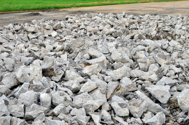 istock Broken pieces of asphalt at a construction site 1208818426
