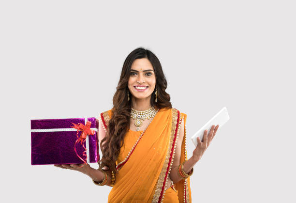 Portrait Of Woman Standing Against White Background