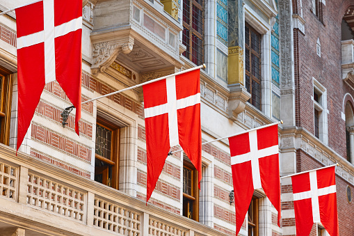 Copenhagen city hall building interior with denmark flags. Danish