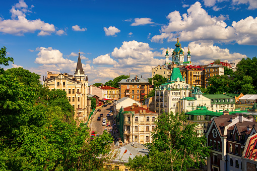 Picturesque view to Andrew's church, Andriivsky descent, Richard the Lionheart House and historic buildings in the center of Ukrainian capital, Kyiv, Ukraine