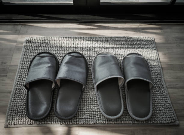 istock Black slippers for wearing in the room. 1208823273