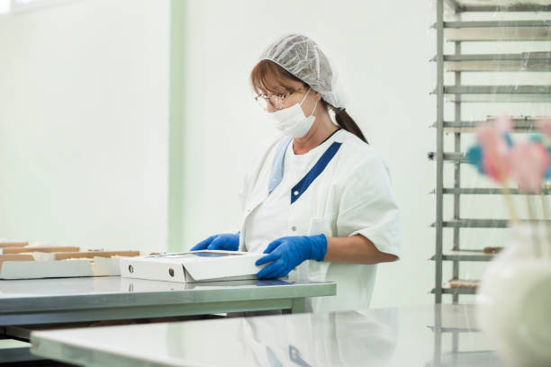 istock Woman working at catering service 1208824143
