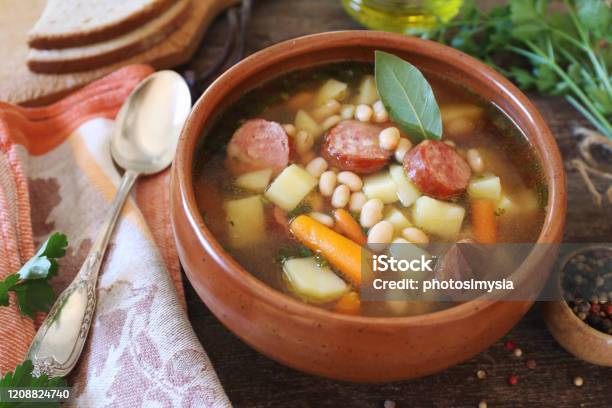 https://media.istockphoto.com/id/1208824740/photo/spanish-cuisine-caldo-gallego-traditional-bean-soup-with-seasonal-vegetables-and-sausages.jpg?s=612x612&w=is&k=20&c=8a8P79TGjVYHZ1ROUMus5eoPw1sag5JQoHeaNVFxr80=