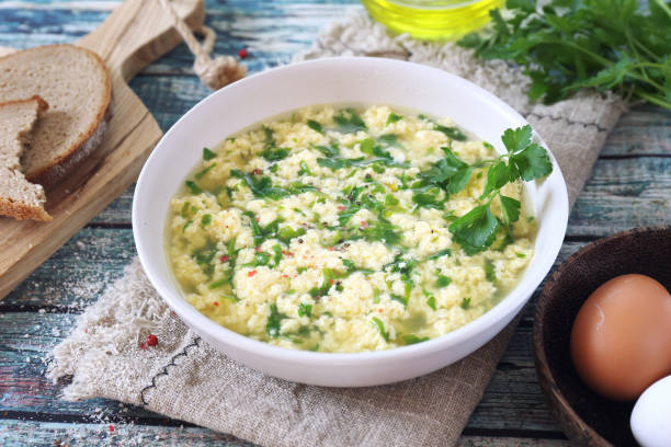 istock Stracciatella soup: parsley, eggs, olive oil and parmesan cheese 1208825386