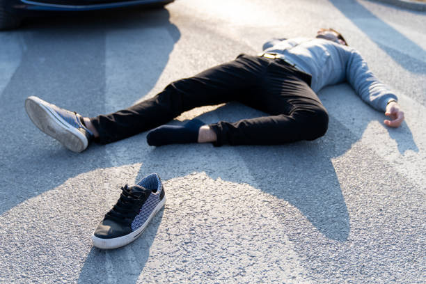 istock Caucasian white man hit by a car on a crosswalk 1208826012