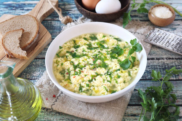 istock Stracciatella soup: parsley, eggs, olive oil and parmesan cheese 1208826103