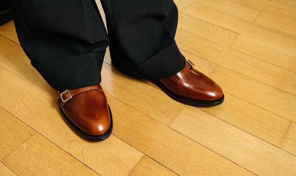 istock Woman wearing luxury leather brown shoes 1208826247
