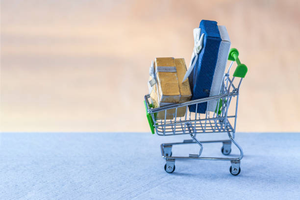 istock Gift boxes in the shopping cart 1208826443
