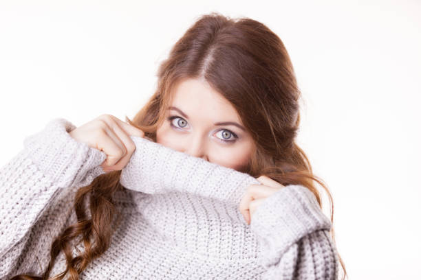 istock Woman feeling comfortable wearing soft sweater 1208827273