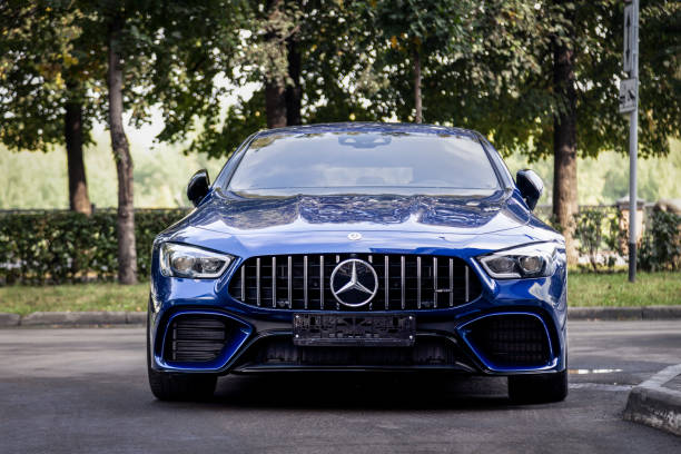 Russia Kemerovo 2019-09-16 blue car Mercedes-AMG GT 63 43 53 4MATIC parked outdoor on street background Russia Kemerovo 2019-09-16 blue car Mercedes-AMG GT 63 43 53 4MATIC parked outdoor on summer street background mercedes benz photos stock pictures, royalty-free photos & images