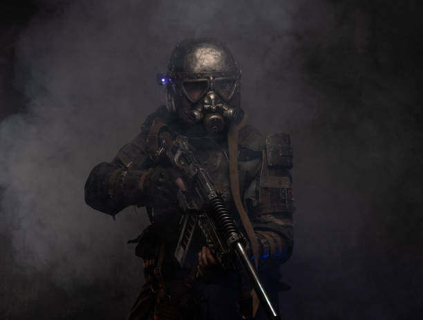 istock Cyborg with weapon in mist and smoke 1208830610