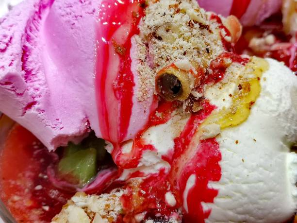Fruit salad with ice cream with honey and nuts