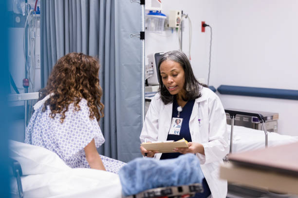 Patient Reading Reference 130+ Patient Reading Card Stock Photos, Pictures & Royalty-Free Images ...
