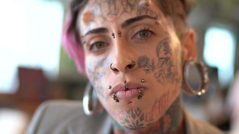 Portrait of tattooed businesswoman at office