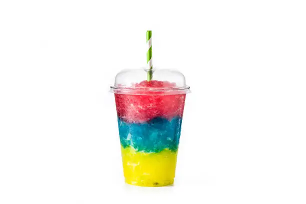 Photo of Colorful slushie with straw in plastic cup