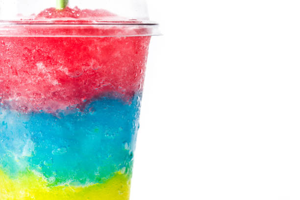 istock Colorful slushie with straw in plastic cup 1208841470
