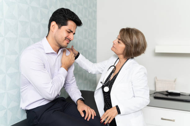 istock Patient Visiting Family Doctor For Checkup 1208842491