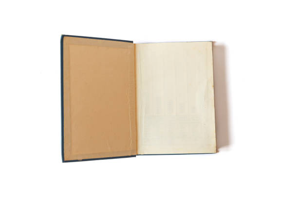 istock Open old book with yellow pages  isolated on white background 1208842681