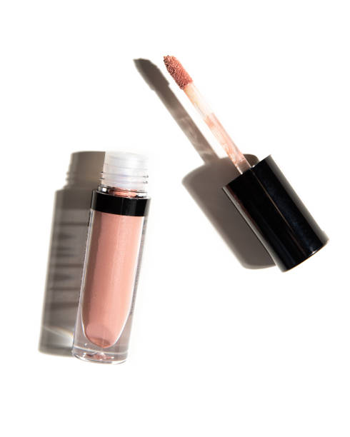 istock Pink lip gloss tube isolated on white background. 1208842904