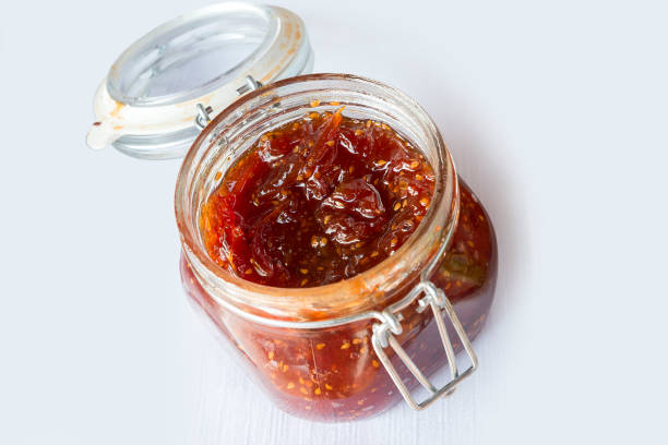 Square glass jar with fig jam