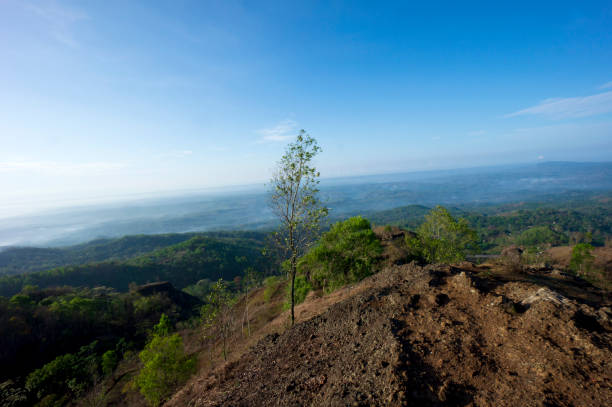 istock The blue sky above an Nglanggeran Ancient Volcano 1208848942