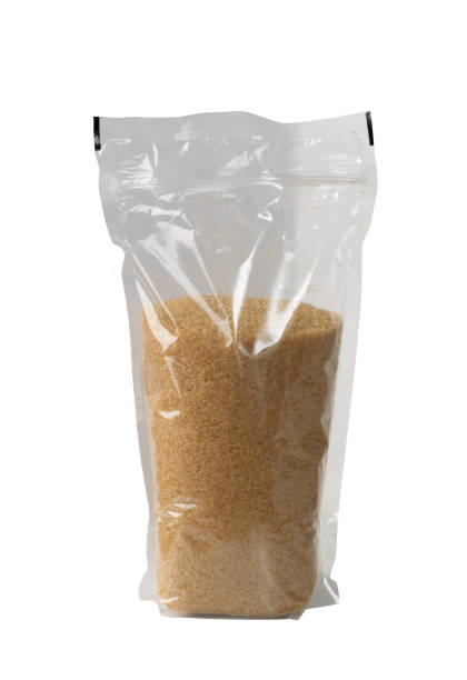 istock Raw Brown Cane Sugar Isolated on White Background 1208849766