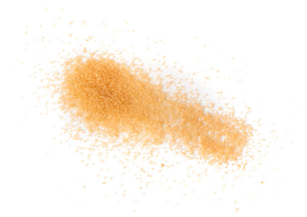 istock Raw Brown Cane Sugar Isolated on White Background 1208849778