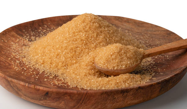 istock Raw Brown Cane Sugar Isolated on White Background 1208849790