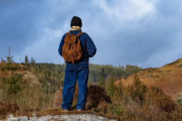 istock Active senior man in a remote rural location in Scotland 1208852992
