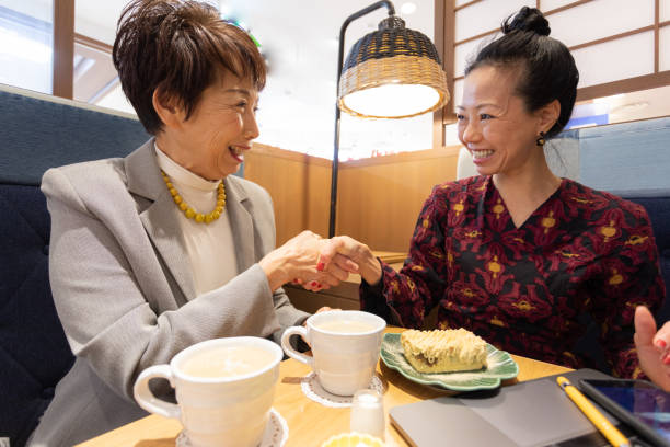 istock Japanese women having meeting 1208853017