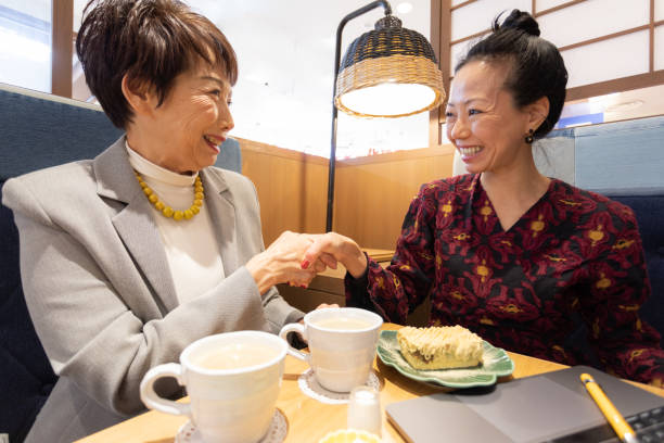 istock Japanese women having meeting 1208853233