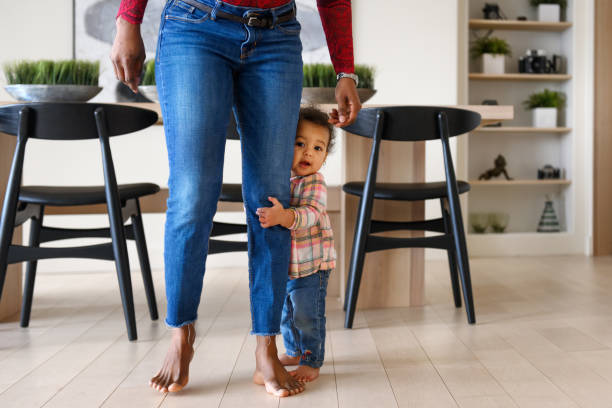 istock Baby girl first steps 1208853322